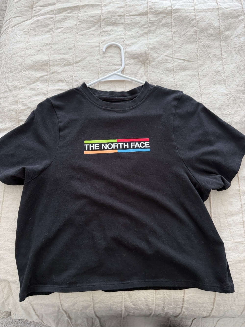 The North Face Black Tee with Red, Green, Blue & Orange Logo